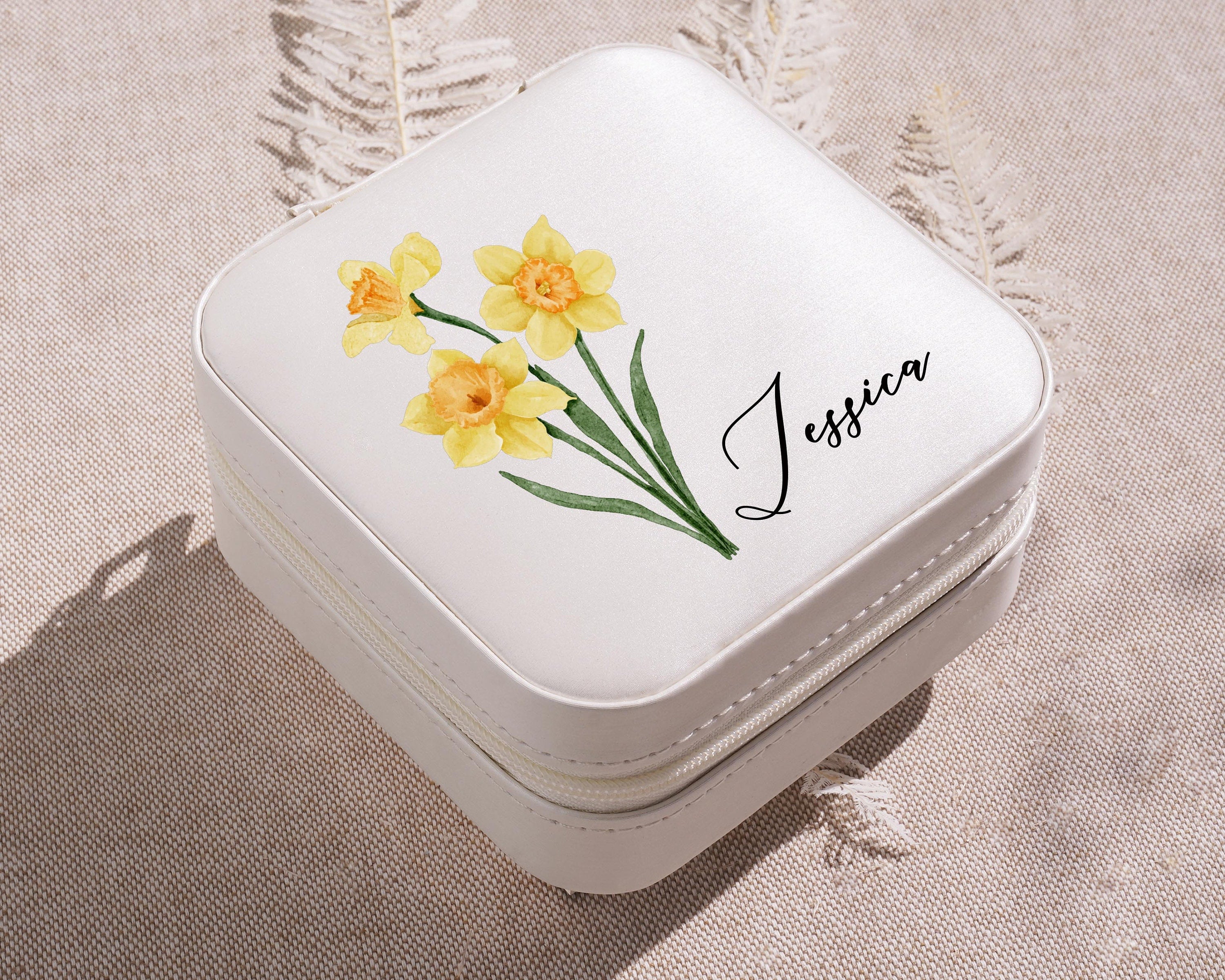 a white box with yellow flowers painted on it