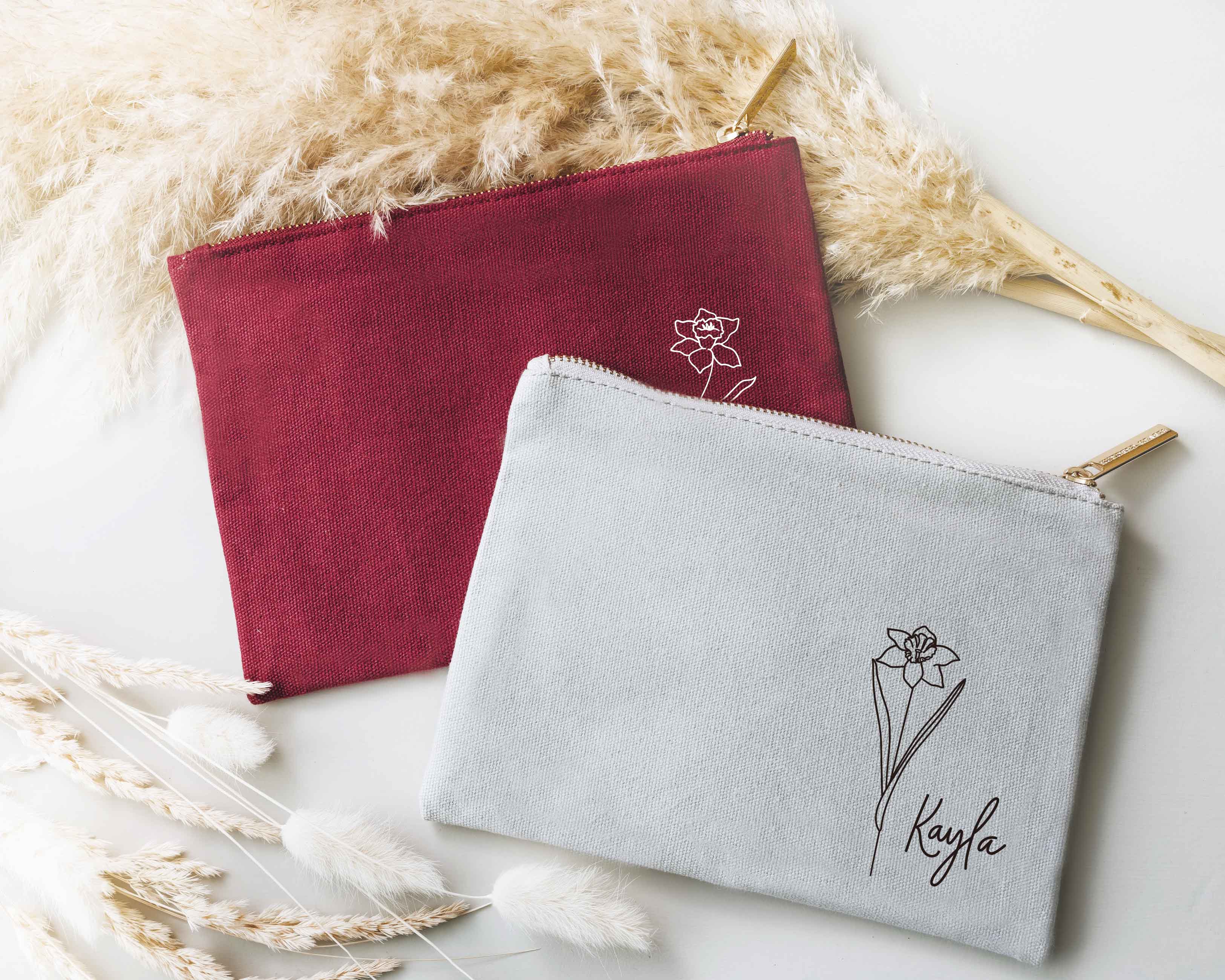 Cranberry and Grey Personalized Cosmetic Bags with birth flower image and name.
